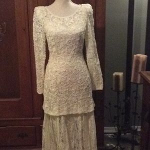 Standout ivory lace sheath w/sheer skirt sz. 12 (B-2)